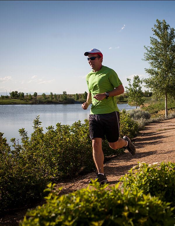 Man on trail in Anthem Master-planned community Broomfield, CO