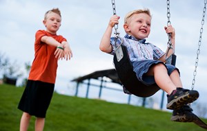 Child playing in park in Anthem master-planned community